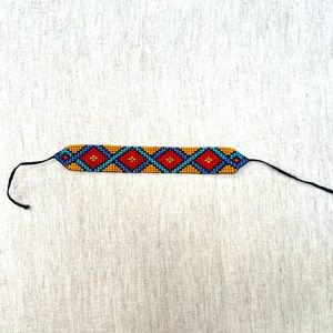 Handmade bracelet by the Wayuu Indigenous People of Colombia